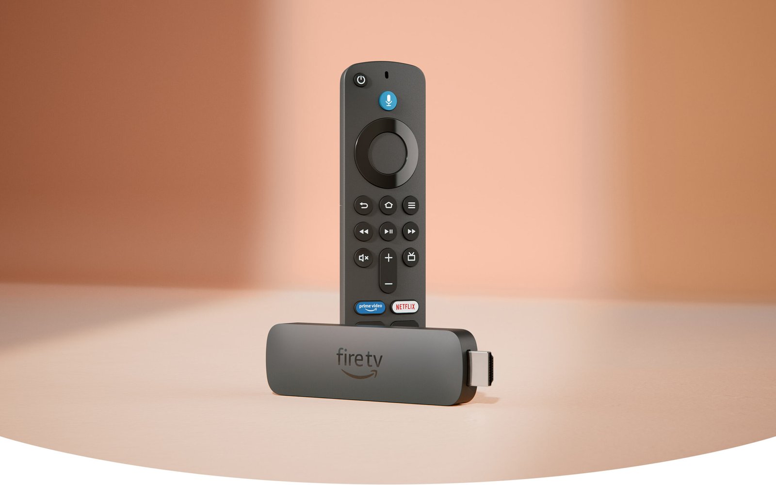 Fire TV Stick 4K: rectangular device with an HDMI connector on one end and a USB-C socket on the side, with Fire TV Alexa Voice Remote, with a navigation ring and buttons on the front and a rounded back.