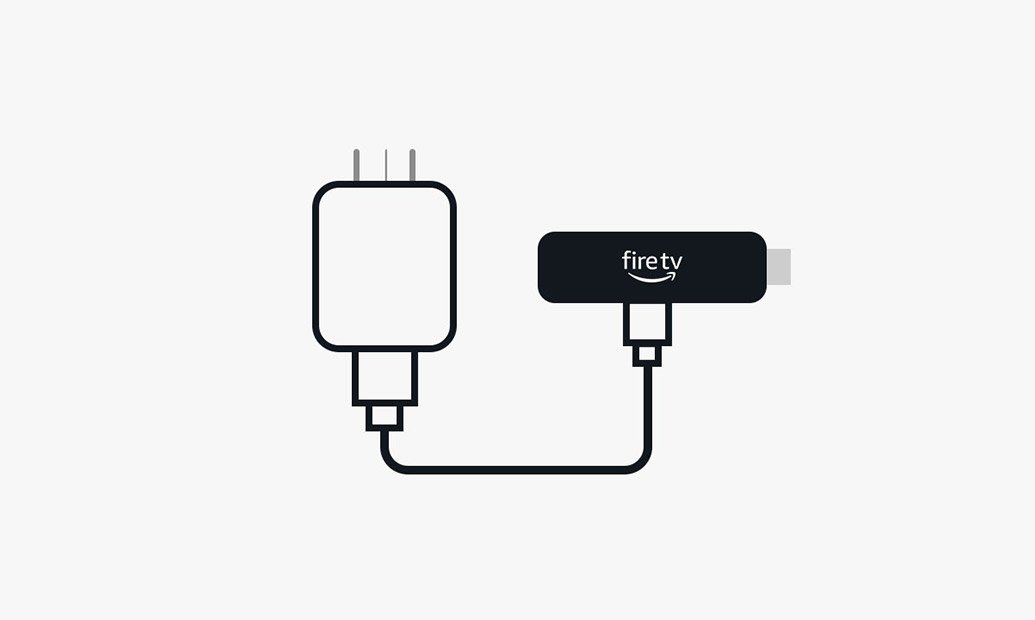 Illustration of a Fire TV Stick: rectangular device with an HDMI connector on one end and a USB-C socket on the side, with a power cable connected to it which leads to a power plug.